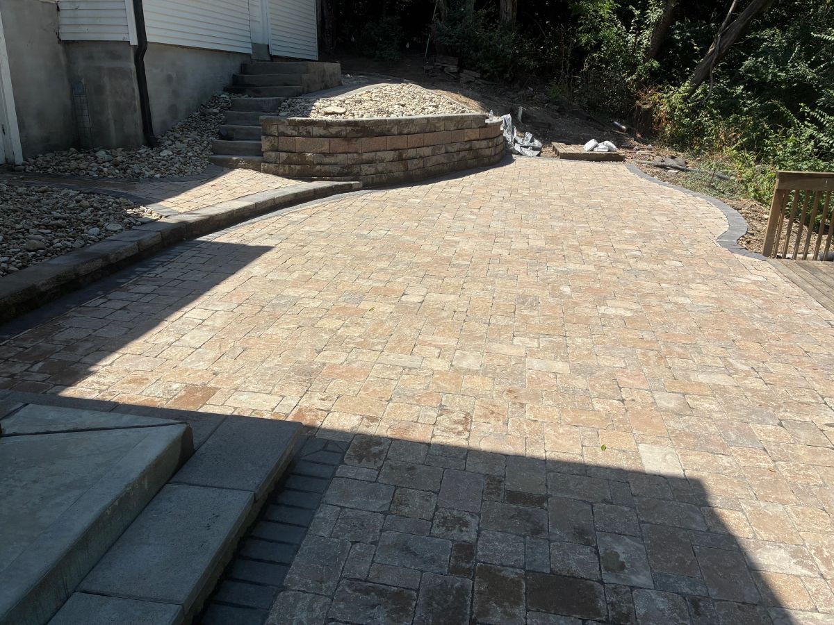 Outdoor living space with seating walls