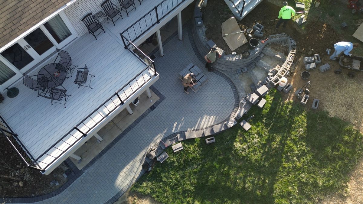 Aerial view of a full property hardscape transformation